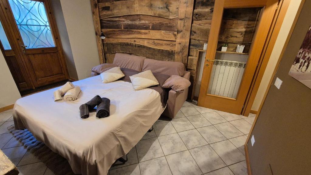 Postel nebo postele na pokoji v ubytování Typical apartment in Valtellina