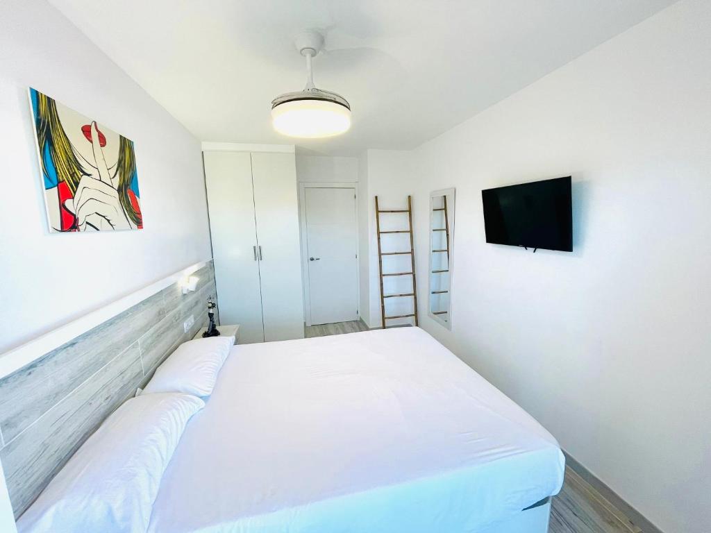 Posteľ alebo postele v izbe v ubytovaní Apartamento Salvis Balcón y piscina