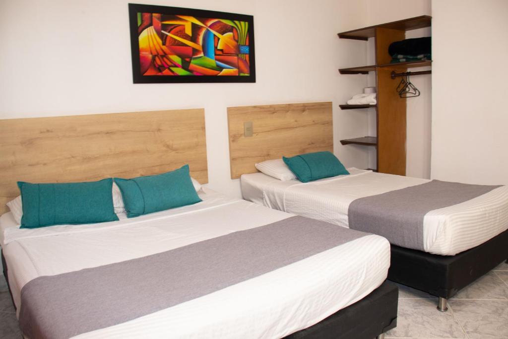 Postel nebo postele na pokoji v ubytování Hotel Balcones del Estadio