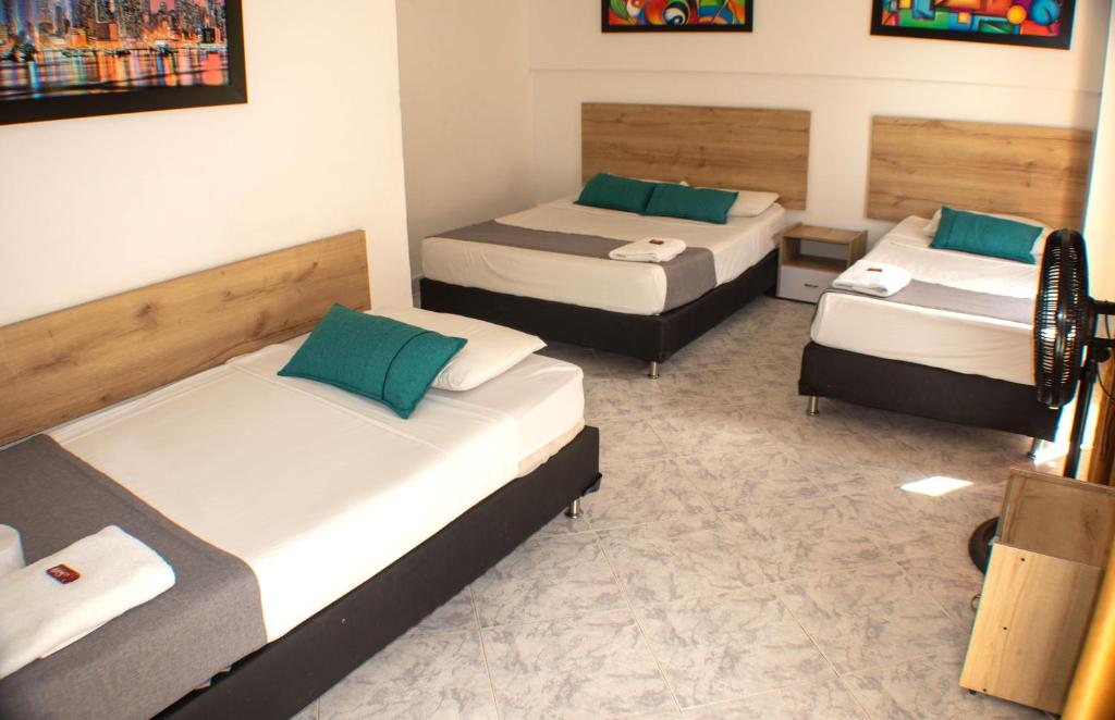 Postel nebo postele na pokoji v ubytování Hotel Balcones del Estadio