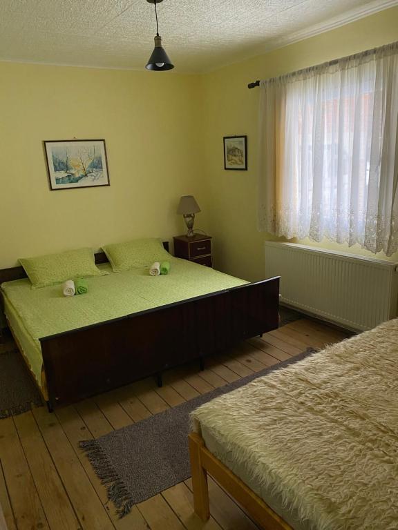 Postel nebo postele na pokoji v ubytování Seosko turističko domaćinstvo Stanišić