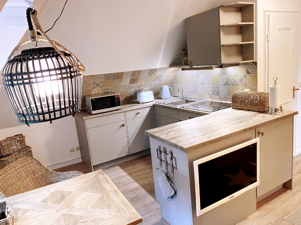 Kuchyň nebo kuchyňský kout v ubytování Hus op de Dün SPO ⇒ Erholung in historischem Flair Wattläufer