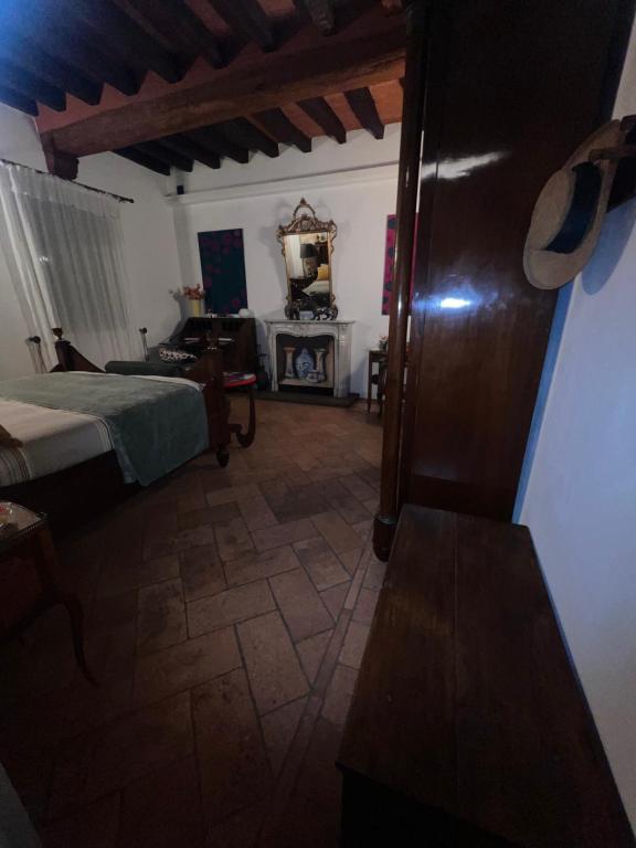 Postel nebo postele na pokoji v ubytování B&B Villa la Canonica con piscina privata a Padernello