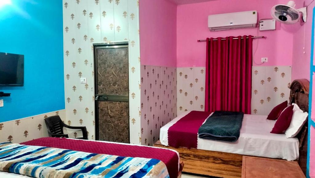 Voodi või voodid majutusasutuse Premshi Guest House toas