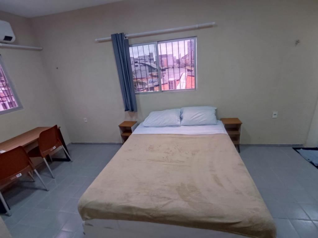 Postel nebo postele na pokoji v ubytování GVR Praia Hostel