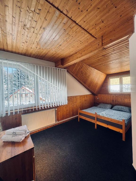 Postel nebo postele na pokoji v ubytování Penzion Berany
