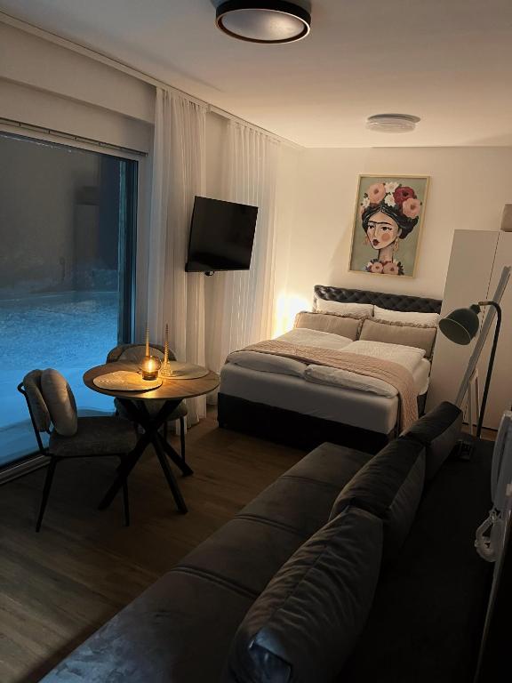 A bed or beds in a room at Divčibarski pogledi