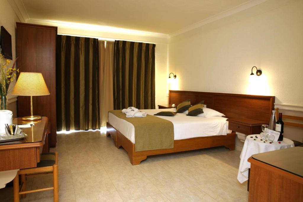 Postel nebo postele na pokoji v ubytování Soreda Hotel