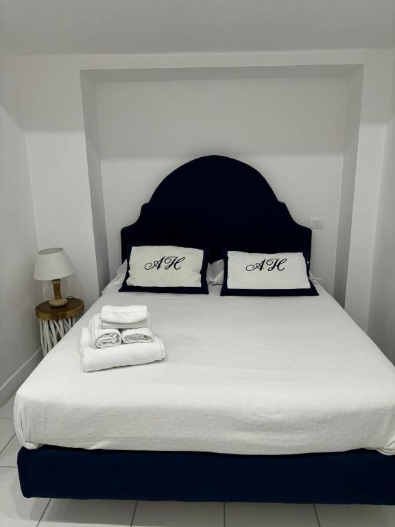 Postel nebo postele na pokoji v ubytování AH Suite Sorrento