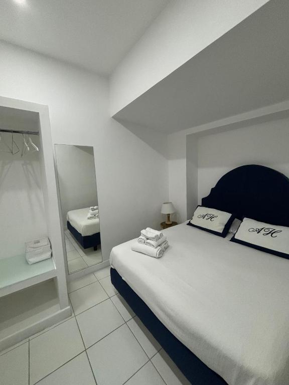 Postel nebo postele na pokoji v ubytování AH Suite Sorrento