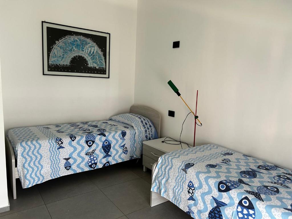 Posteľ alebo postele v izbe v ubytovaní Casa Roxy