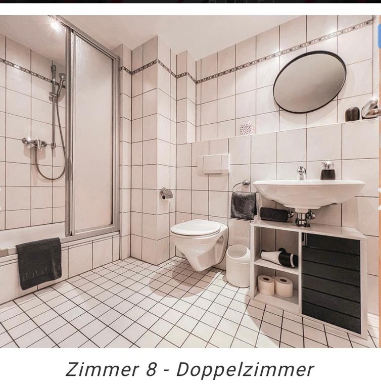Koupelna v ubytování Hotel Weinstube am Markt