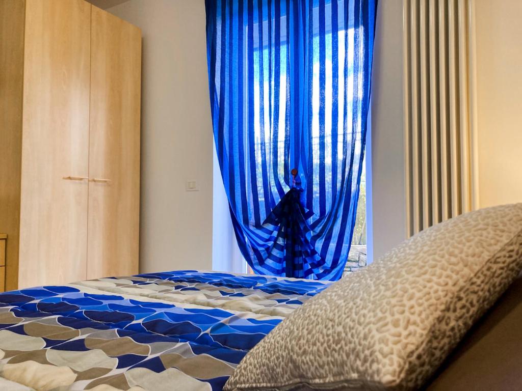 Postel nebo postele na pokoji v ubytování Elegante 1 Br, Bellavista in Valsugana, Trentino