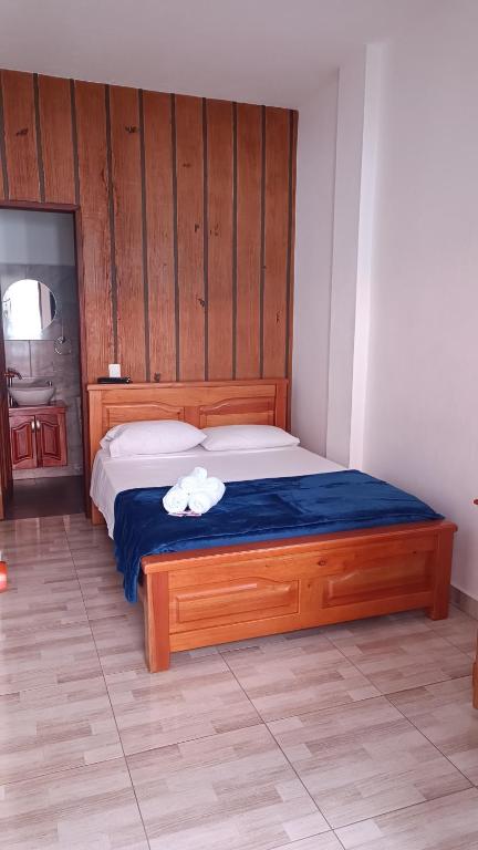 Postel nebo postele na pokoji v ubytování Hotel Macao