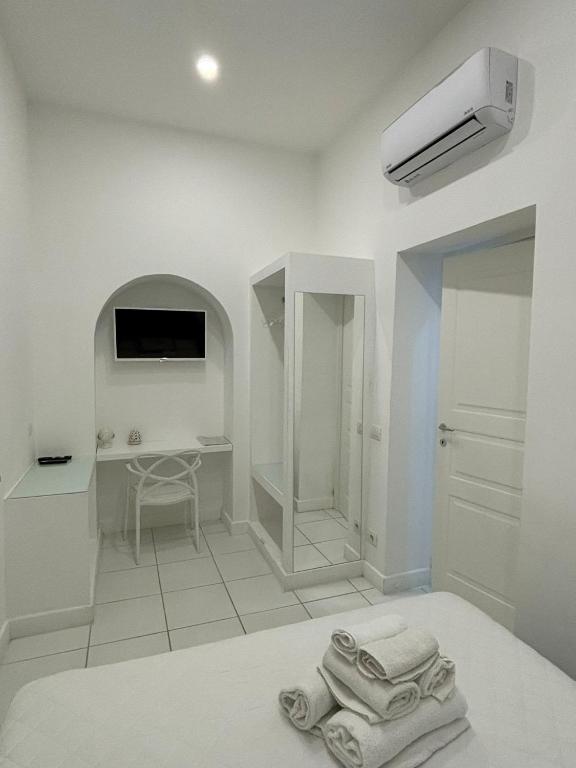 Postel nebo postele na pokoji v ubytování AH Suite Sorrento