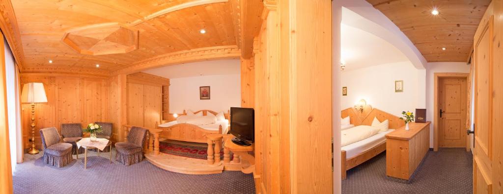 Postel nebo postele na pokoji v ubytování Hotel Berghof