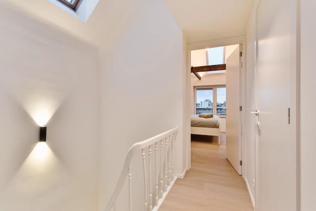 Letto o letti in una camera di Luxe Stay in Heart of Mechelen