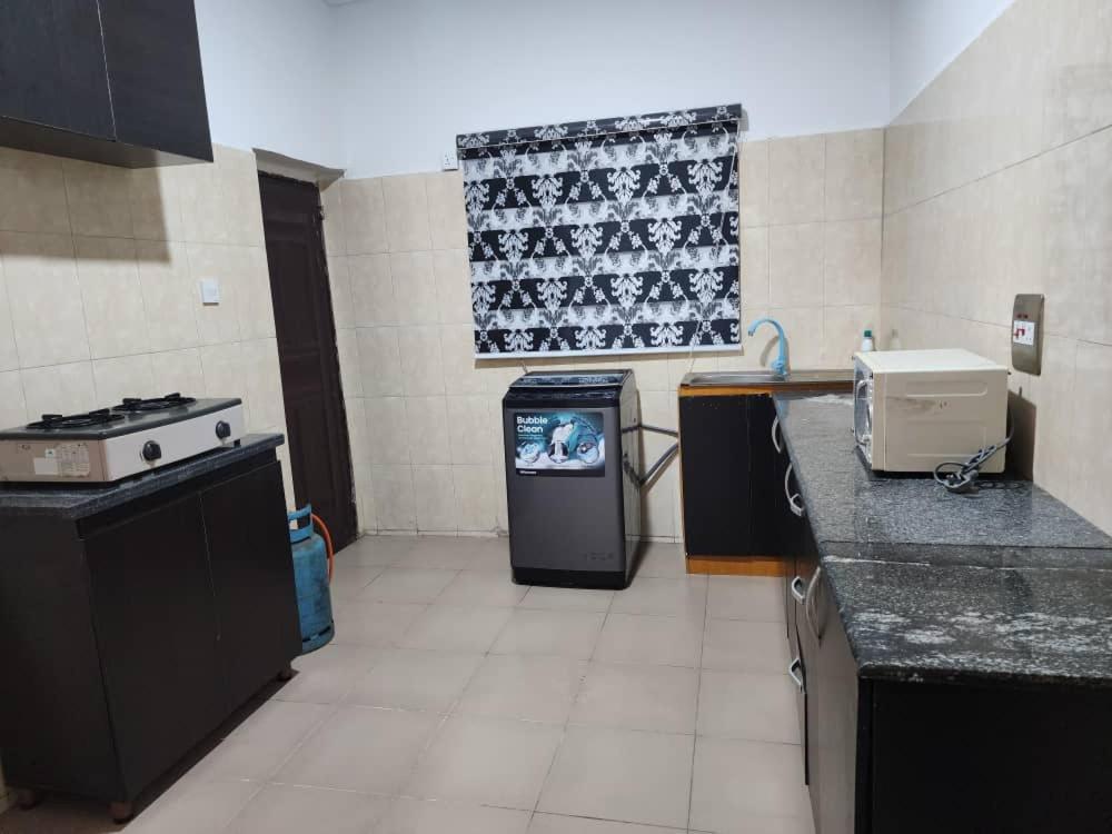 Kuchyň nebo kuchyňský kout v ubytování De Appariement