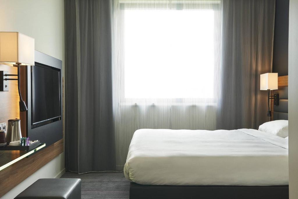 TV a/nebo společenská místnost v ubytování Moxy Munich Messe
