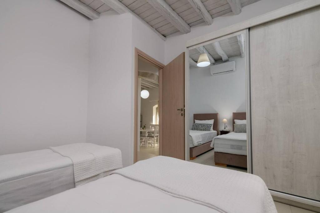 Postel nebo postele na pokoji v ubytování Chrisanthi Elegant Villa