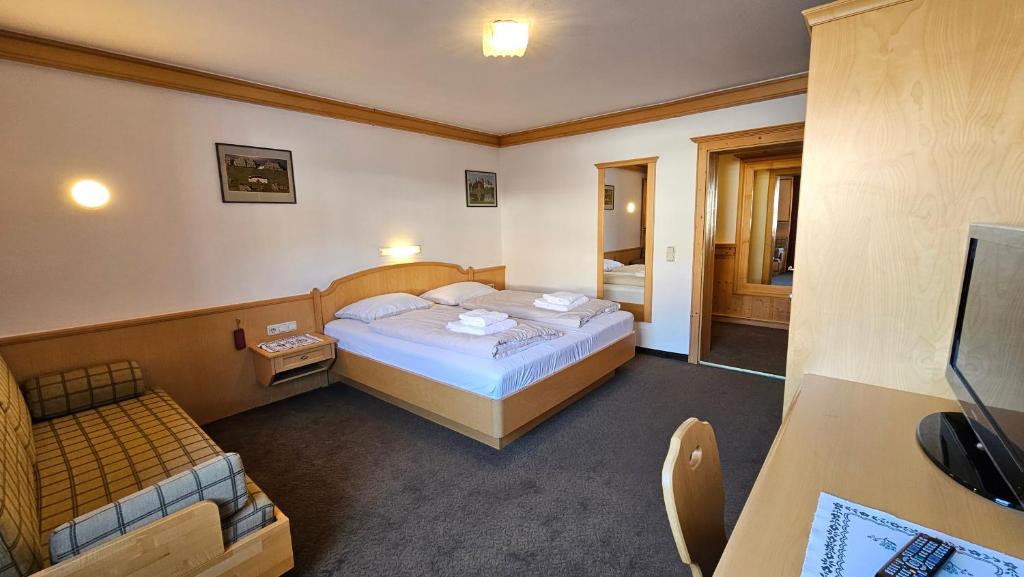 Postel nebo postele na pokoji v ubytování Absolute Active Resort Margret
