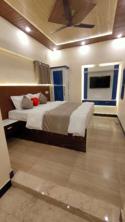 Postel nebo postele na pokoji v ubytování SK Residency
