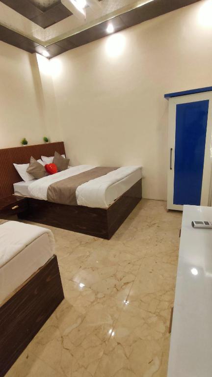 Postel nebo postele na pokoji v ubytování SK Residency