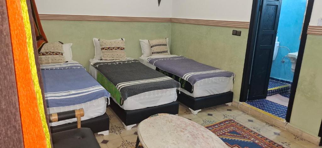 Postel nebo postele na pokoji v ubytování Riad Bab Imlil