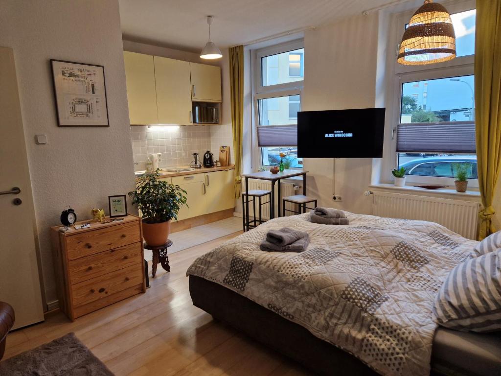 Postel nebo postele na pokoji v ubytování kleines Appartement - zentral, citynah, Stadion, Westfallenhalle