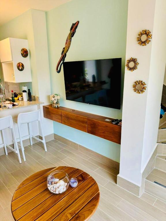 TV a/nebo společenská místnost v ubytování Beach Resort Entire Home