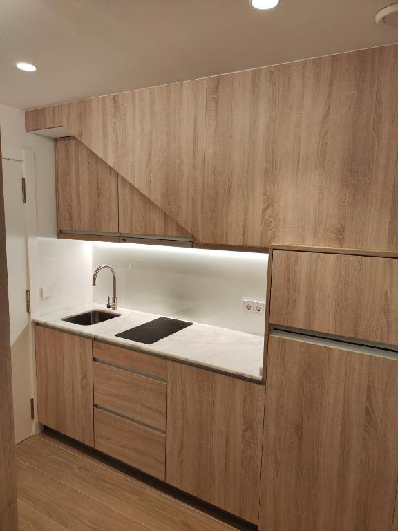 Kuchyňa alebo kuchynka v ubytovaní Apartamentos A pousa do Asma