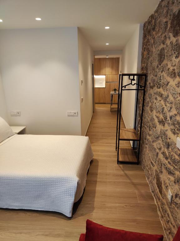 Posteľ alebo postele v izbe v ubytovaní Apartamentos A pousa do Asma