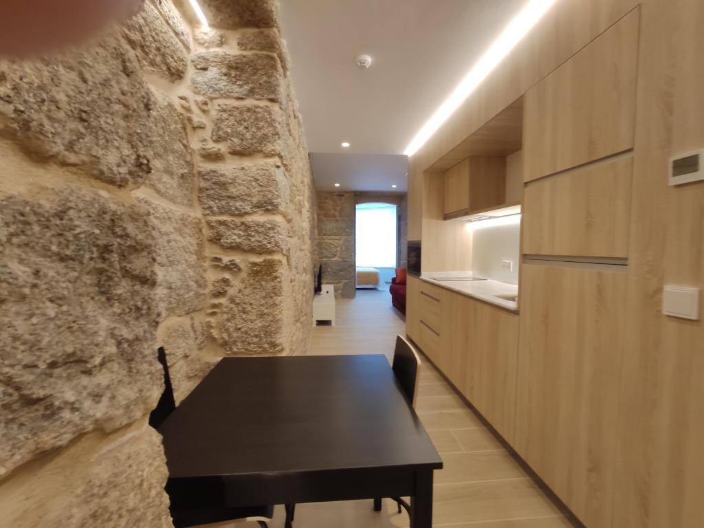 Kuchyňa alebo kuchynka v ubytovaní Apartamentos A pousa do Asma