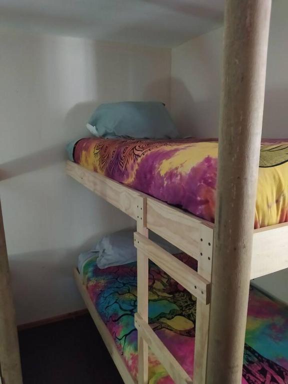 Postel nebo postele na pokoji v ubytování Hostal Nahuel Ray