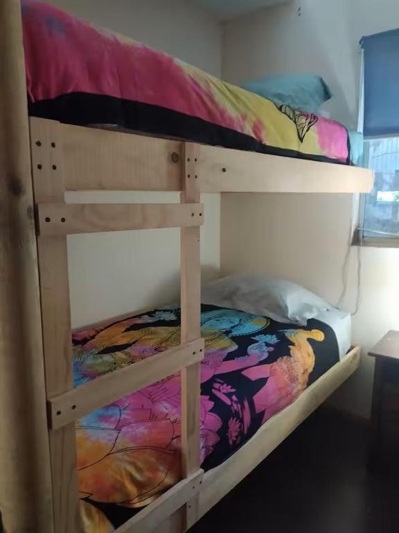 Postel nebo postele na pokoji v ubytování Hostal Nahuel Ray