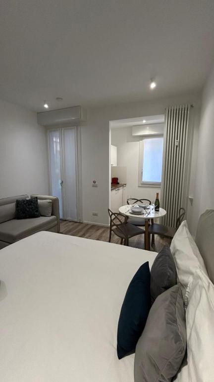 Posteľ alebo postele v izbe v ubytovaní Milanofierapartments