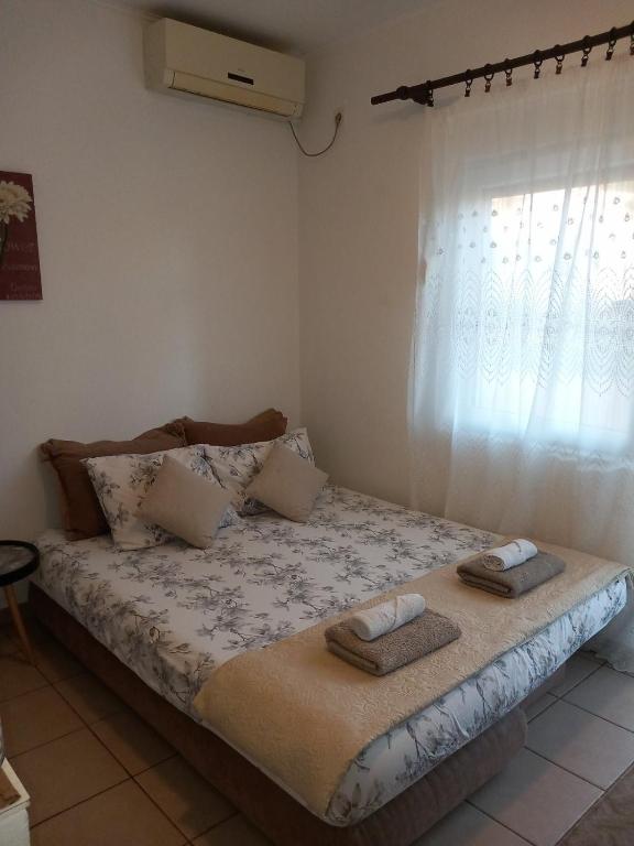Postel nebo postele na pokoji v ubytování Apartmani Markovic-jednosoban