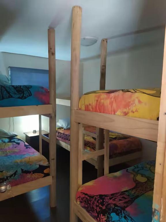 Postel nebo postele na pokoji v ubytování Hostal Nahuel Ray
