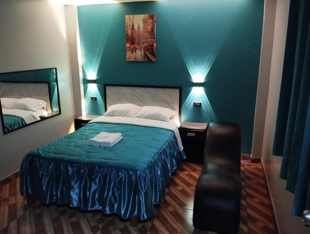 Postel nebo postele na pokoji v ubytování Hostal El Pilar