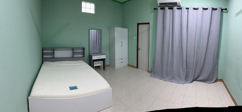 Postel nebo postele na pokoji v ubytování H&F guest house