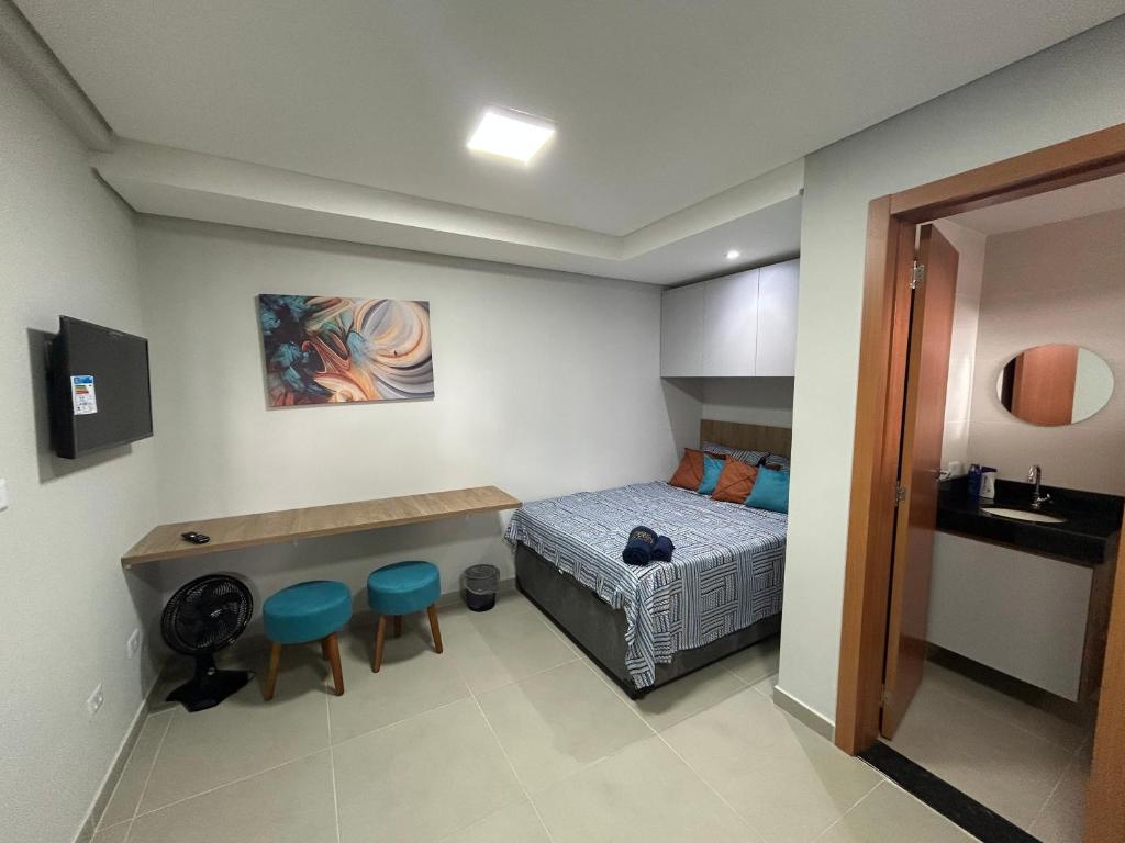 Postel nebo postele na pokoji v ubytování Novidade - Apartamento Grey #104
