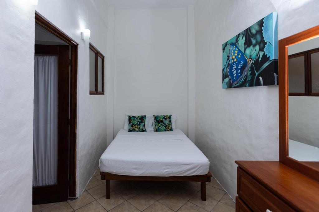 Postel nebo postele na pokoji v ubytování Condiminium Villas Mymosa