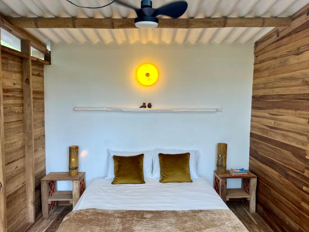 Letto o letti in una camera di La Mona Eco Cabins