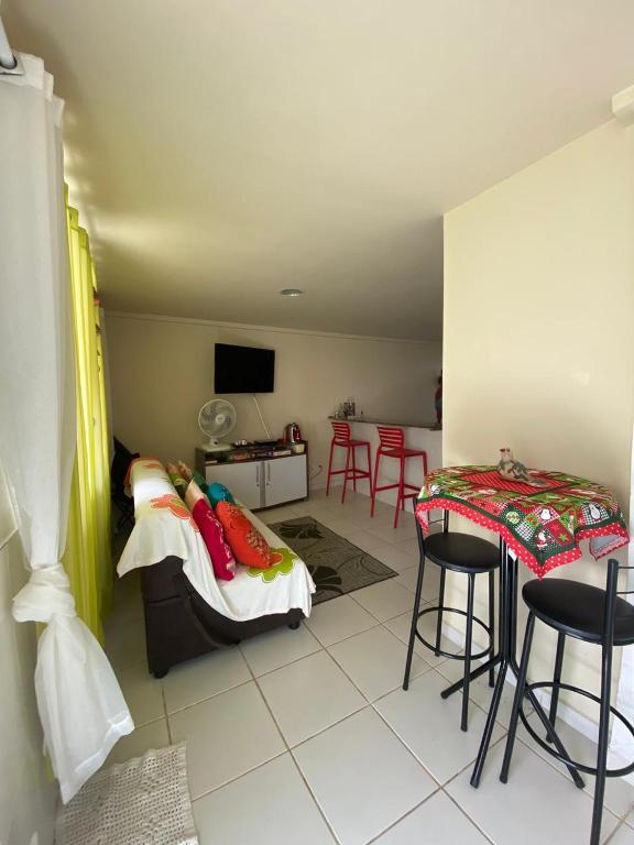 TV a/nebo společenská místnost v ubytování Guest House Paraiso Pataxos
