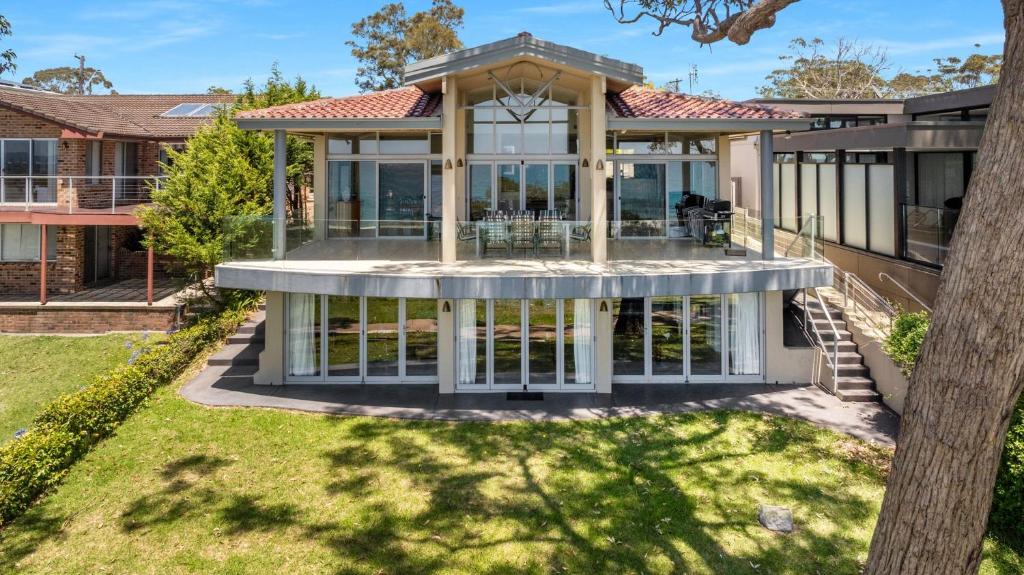 an image of a house with a porch at Famagusta - Belle Escapes Jervis Bay in Vincentia
