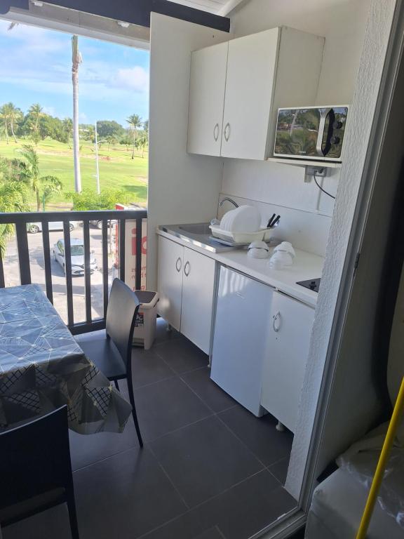 Kuchyň nebo kuchyňský kout v ubytování Appartement Duplex Marine 5