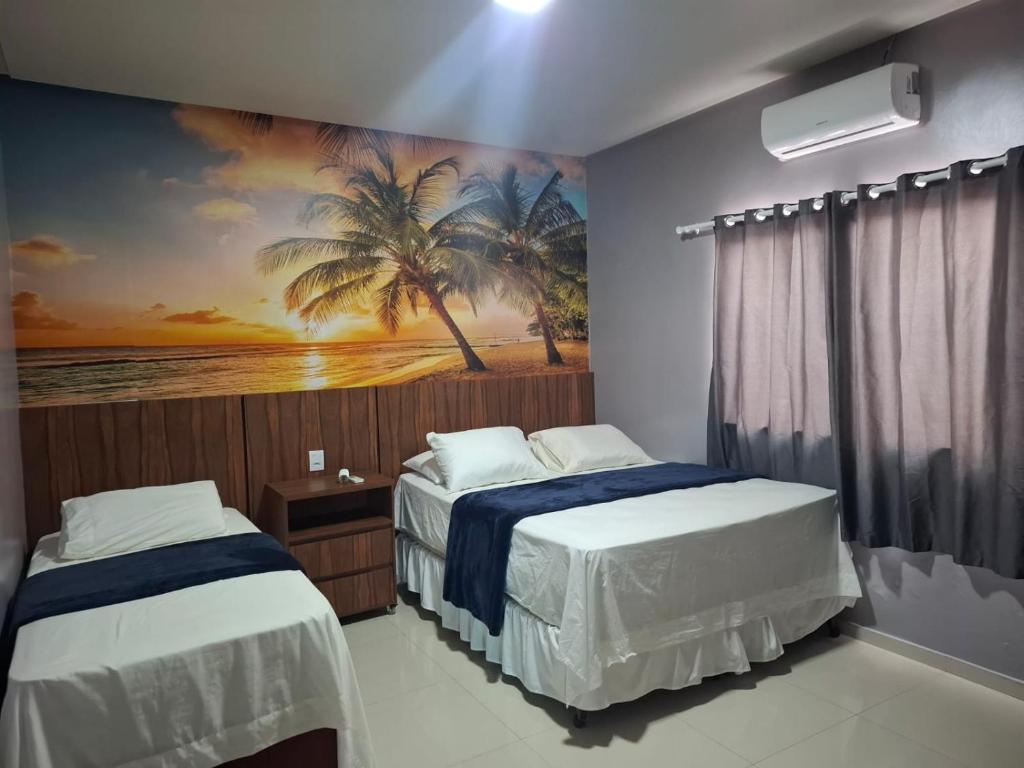 Ένα ή περισσότερα κρεβάτια σε δωμάτιο στο PRADO-CARIBE DO NORDESTE: CASA TEMPORADA!!!