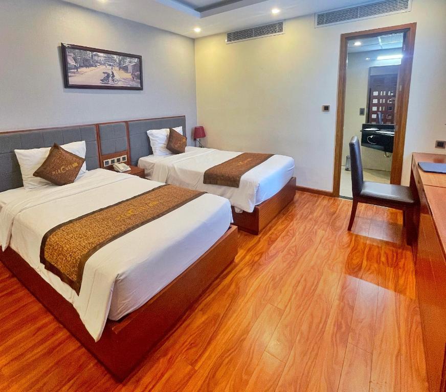 Postel nebo postele na pokoji v ubytování Mercury Apartment Danang