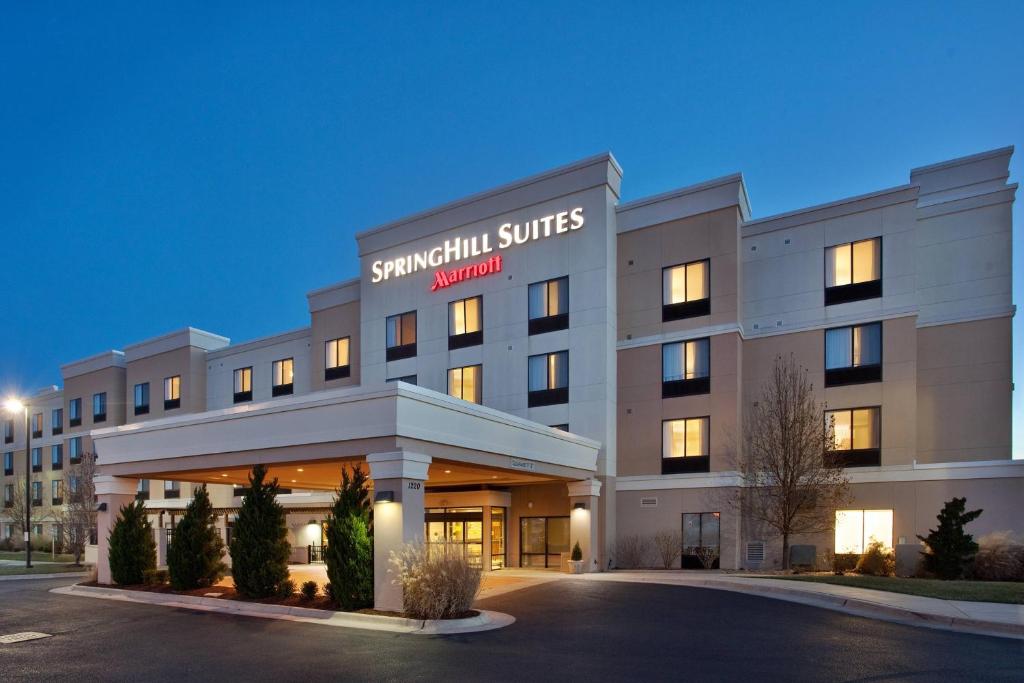 a rendering of the front of a hotel at Springhill Suites by Marriott Wichita East At Plazzio in Wichita