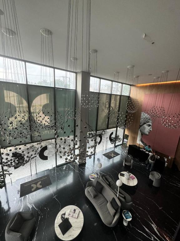 a room with chairs and tables in a building at Apartment with city views central area in Guadalajara